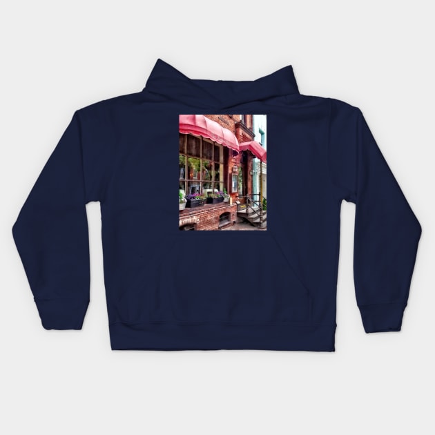 Alexandria VA - Red Awnings on King Street Kids Hoodie by SusanSavad